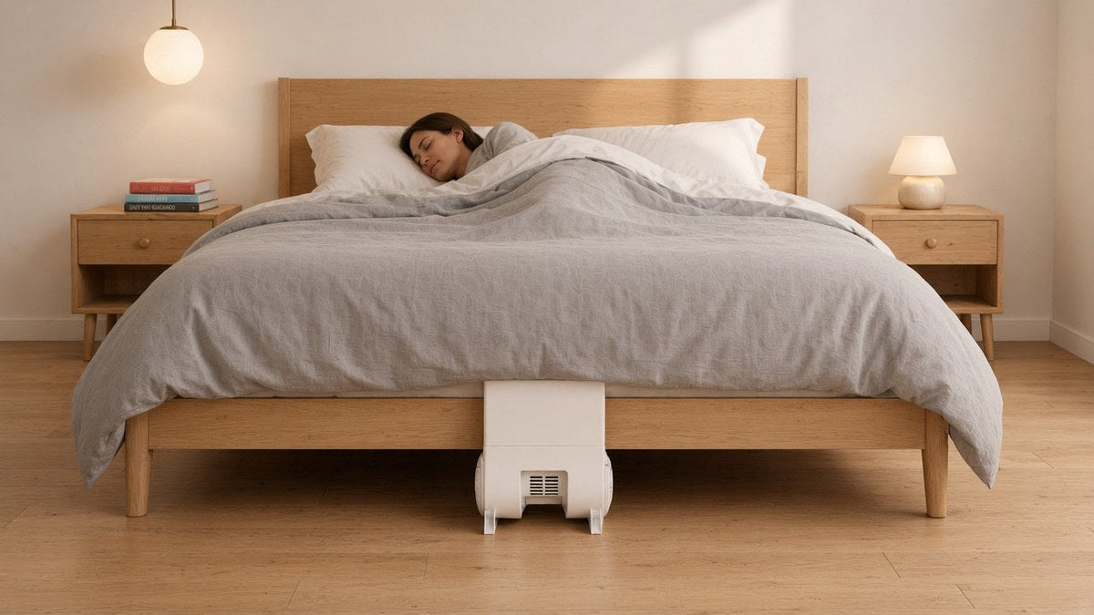 Wegovy night sweats: a woman asleep with a bFan bed fan at the foot of the bed